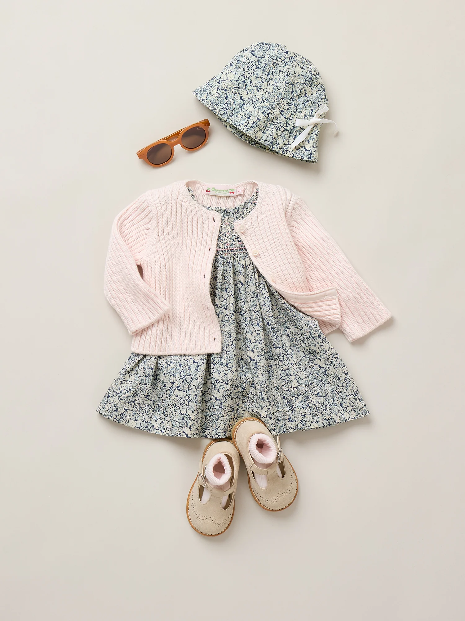 Cadelili smocked and hand-embroidered dress in Liberty organic cotton fabric