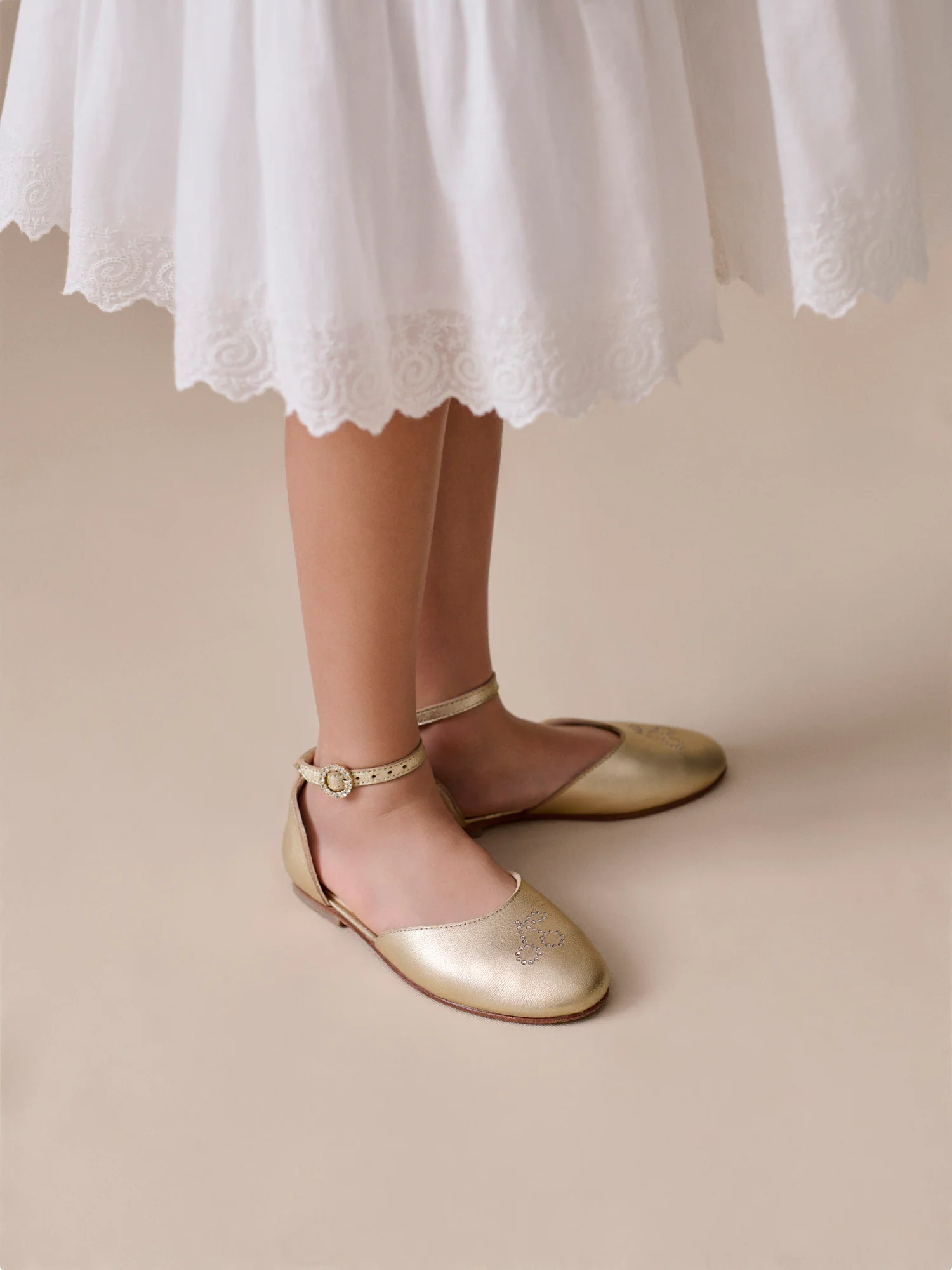 Felyne gold leather ballerina flats